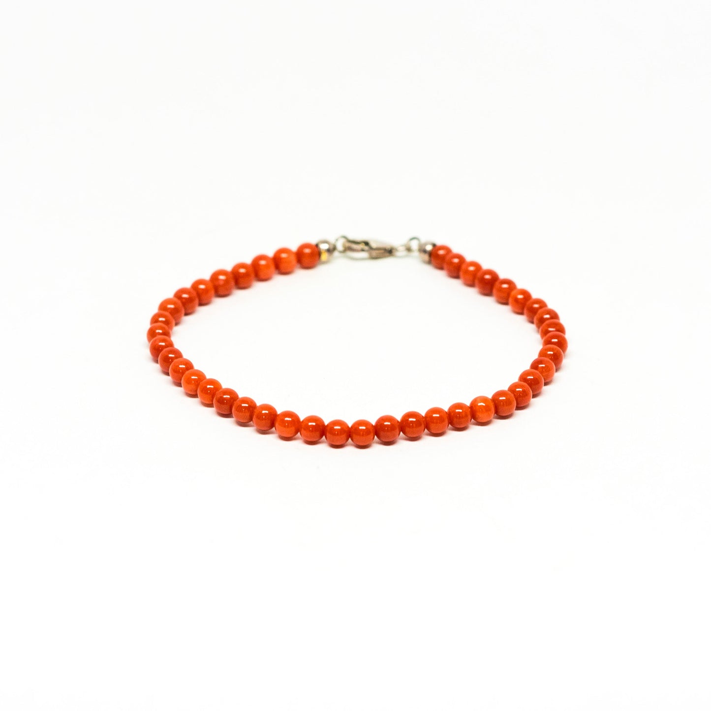 Bracciale in Corallo Rosso e Oro Rich text editor