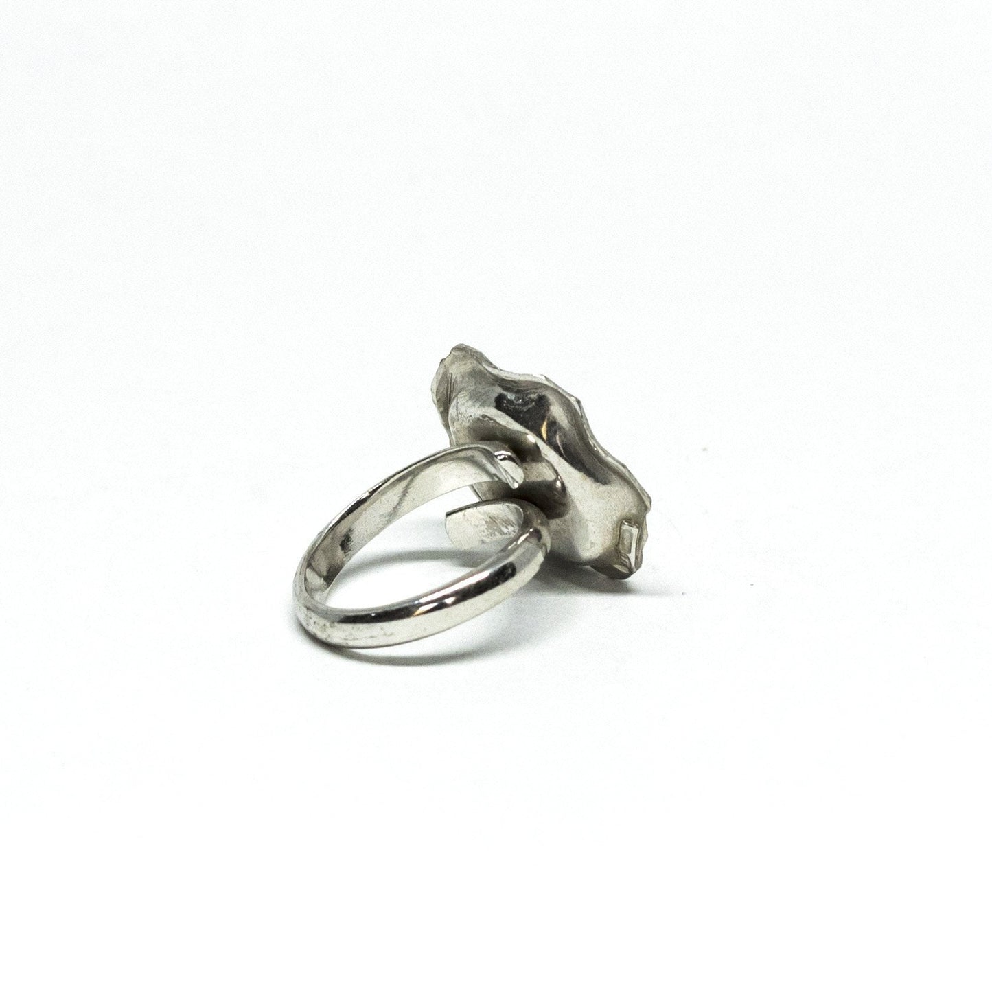 Red coral ring framed by embossed silver