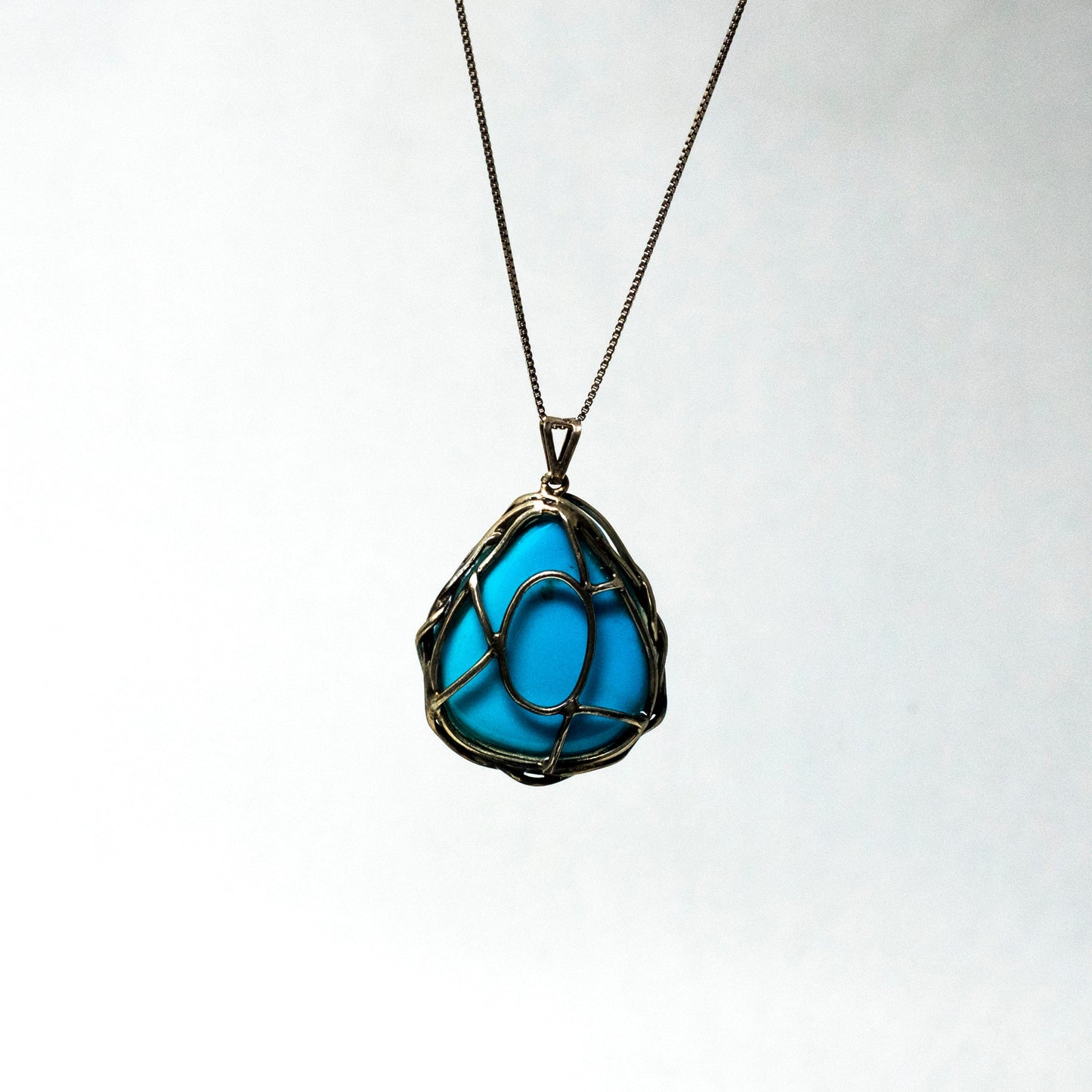 Pendant with Silver and Turquoise Weave