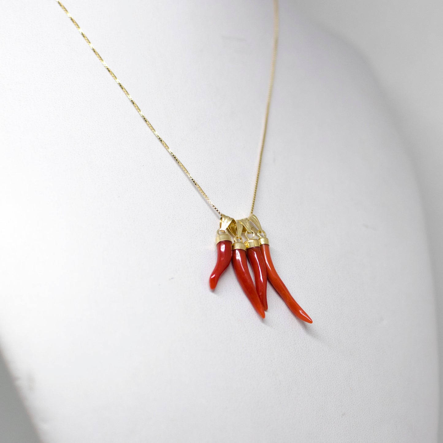 Red Coral Pendant Lucky Horn in Gold