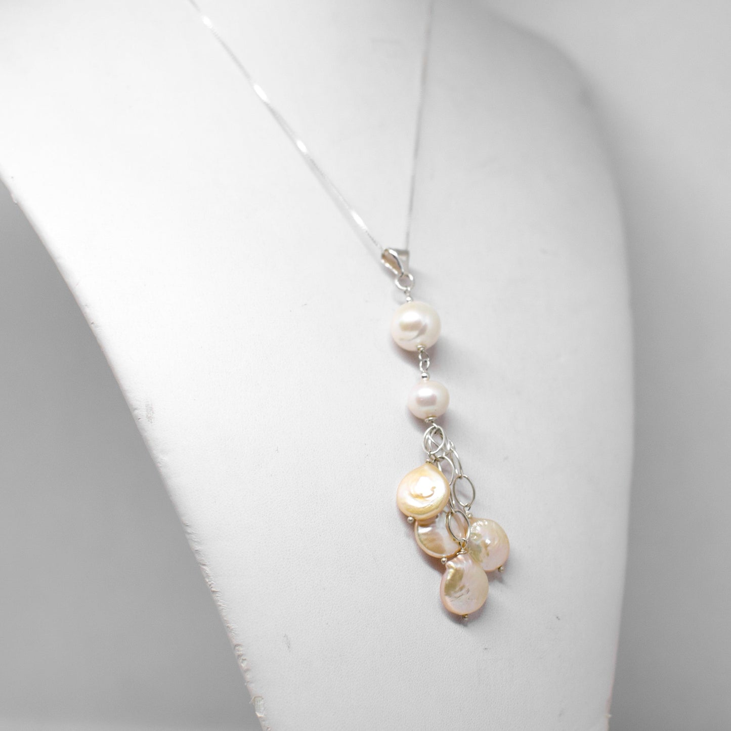 Pearl and mother of pearl pendant