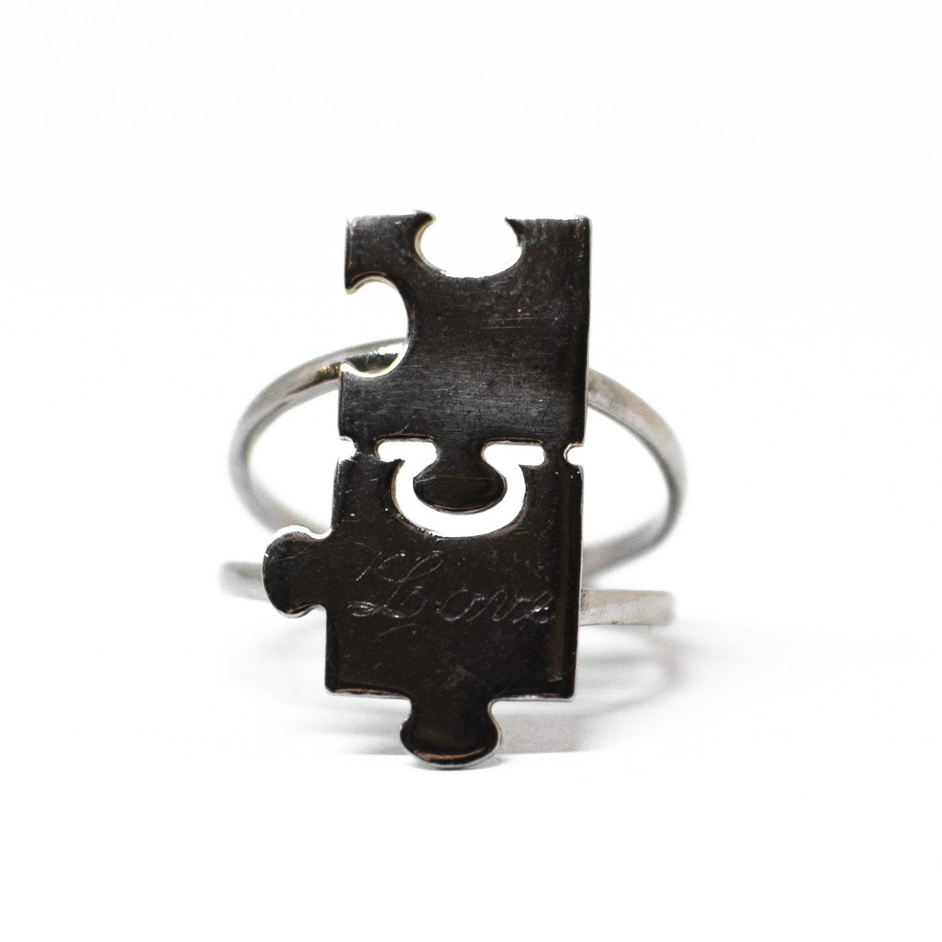 "Lovers' Puzzle" Ring Entirely in Silver